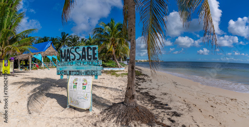 View of rustic massage sign on beach near Puerto Morelos, Caribbean Coast, Yucatan Peninsula, Mexico photo