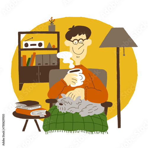 部屋で読書とコーヒーを楽しむ男性