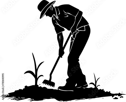 A strong silhouette of a farmer tilling the soil, depicting agriculture, cultivation, and rural life.