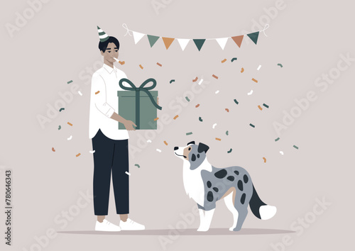Celebrating a blue marble Border Collies Birthday With Festive Cheer, An owner presents a gift to an attentive puppy amidst a shower of confetti