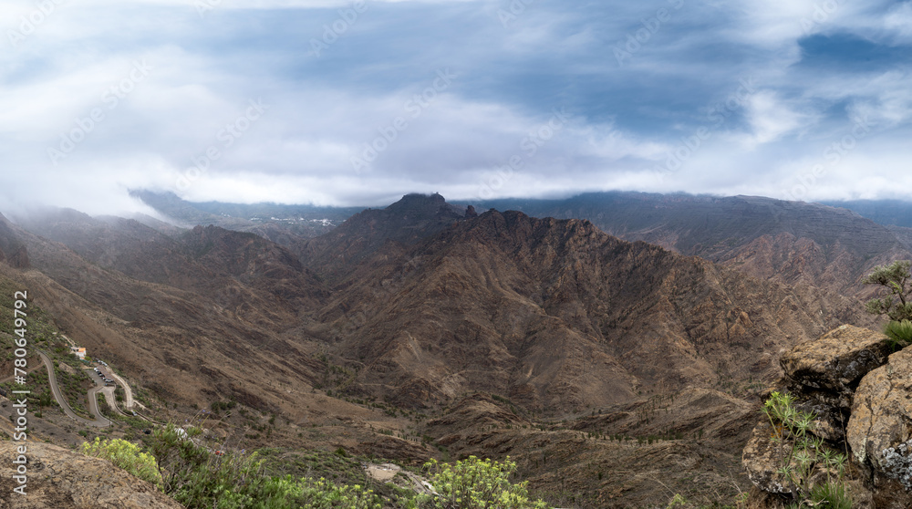 Panoramic view of Bentayga rock covered by clouds in the top of Gran Canaria . Gran Canaria. Canary islands	