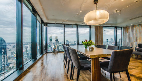 dining room interior design; contemporary luxurious design ideas and concepts; glas hanging lamps on ceiling and panoramic big city skyline view