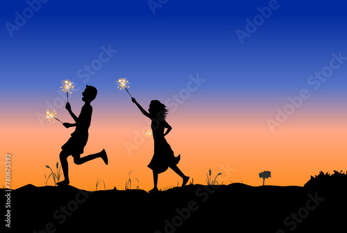 children are playing with fireworks while running in the grassland with the night sky in the background