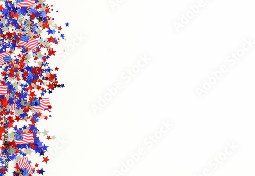 4th of July USA Independence Day confetti decorations american flag colors top view isolated on white background template mock up. Copy space. Celebration Memorial day in America.