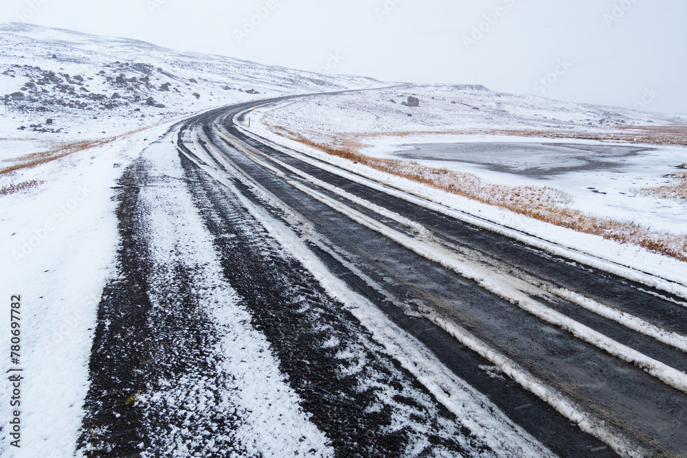 Autumn in the central highlands of Iceland: unpaved gravel road partly covered with freshly fallen snow
Autumn in the central highlands of Iceland: unpaved gravel road partly covered with freshly fallen snow