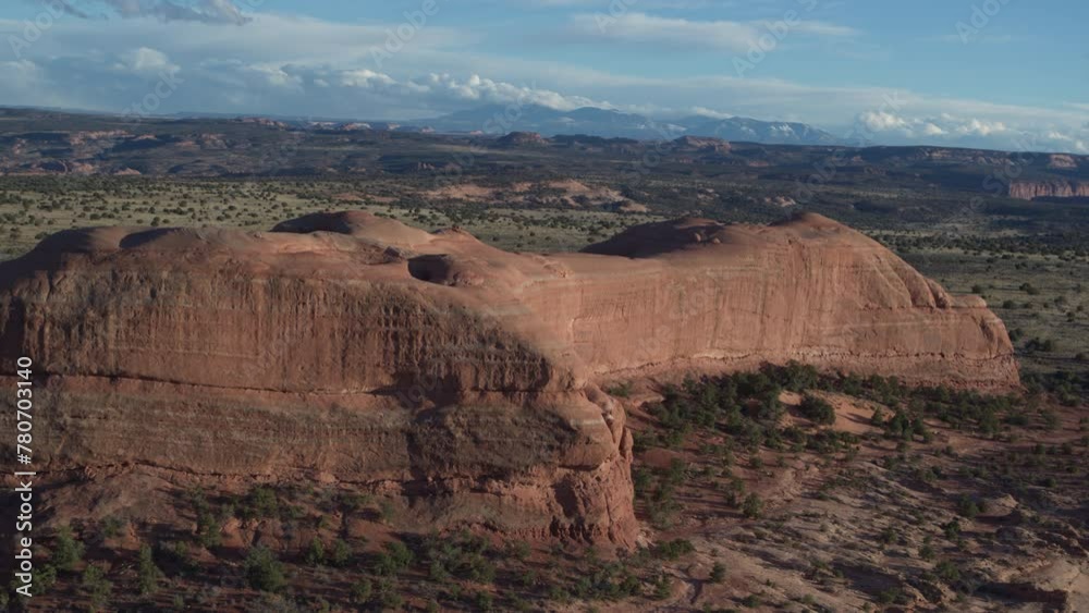 Aerial of red sandstone mesa in Moab Utah in spring by Behind the Rocks trail Aerial of red sandstone mesa in Moab Utah in spring by Behind the Rocks trail