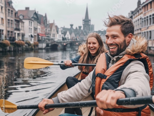 Happy man and woman paddling a kayak together, cityscape with old architecture behin concept citytrip, travel photo