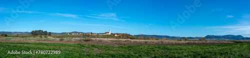 Panoramic view of a hungarian village called Csatoszeg in hungarian, Cetatuia in romanian, with the 13 century catholic church.