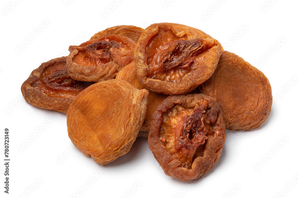 Heap of dried peach fruit close up isolated on white background Heap of dried peach fruit close up isolated on white background
