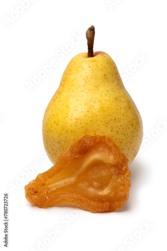 Single dried pear fruit and a fresh pear close up isolated  on white background