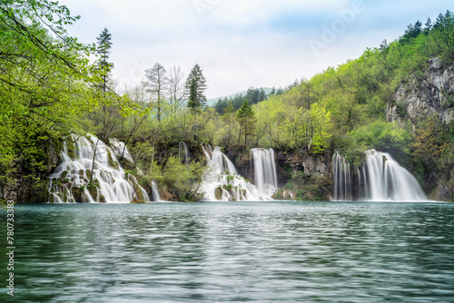 Amazing picture with some of picturesque waterfalls in the green spring forest of Plitvice national park in Croatia. Plitvice lakes closer view..
