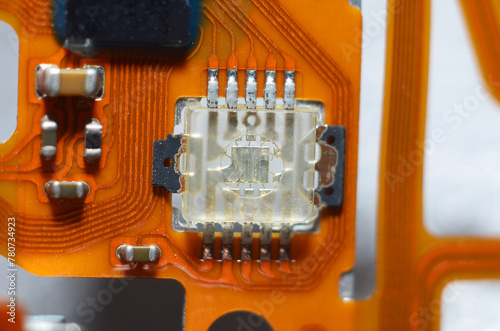 Parts and components on printed circuit boards close-up photo