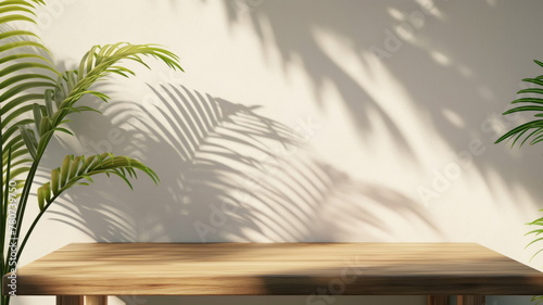 Wooden table and white empty wall with plant shadows. Table shadow background © Mars0hod