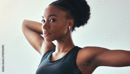 Portrait, fitness and stretching with confident black woman in studio isolated on white background for workout. Exercise, health and warm up with serious young sports model at start of training