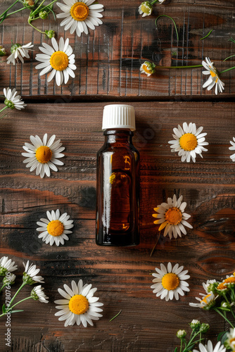chamomile essential oil in a bottle. Selective focus.