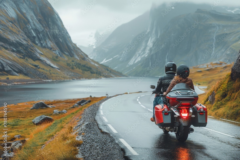 An elderly couple on a motorcycle ride through a breathtaking, misty mountainous landscape with a serene lake