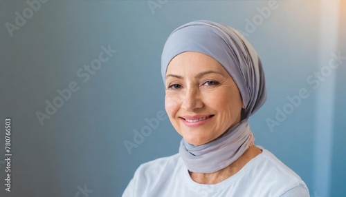 elderly woman in a headscarf for cancer patients, recovering from illnessa