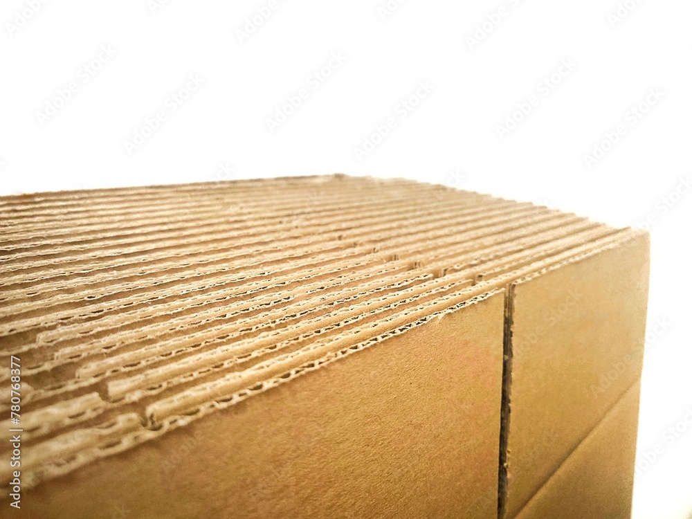 Fototapeta premium Photo of a stack of packaging cardboard boxes, isolated on white background.