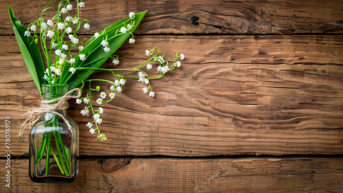 lily of the valley essential oil in a bottle. Selective focus.