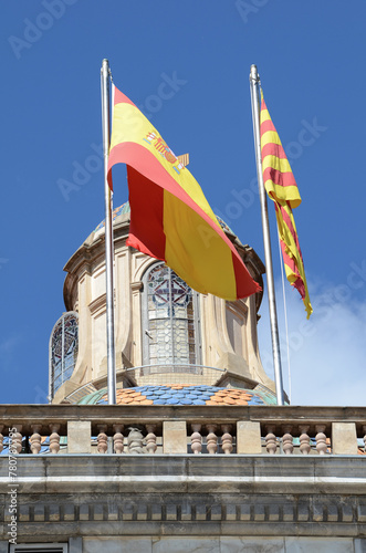 Flags of Spain and Catalonia Together - Palau de la generalitat de Catalunya in Barcelona photo