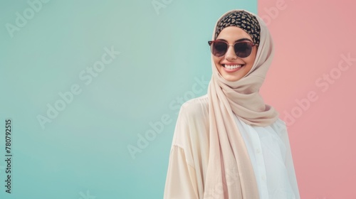 Happy young woman in summer outfit smiling and looking at camera over soft color background 