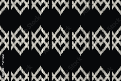 Traditional Ethnic ikat motif fabric background pattern geometric .African Ikat embroidery Ethnic oriental pattern black background wallpaper. Abstract,vector,illustration.Texture,frame,decoration. © FirstFreedom