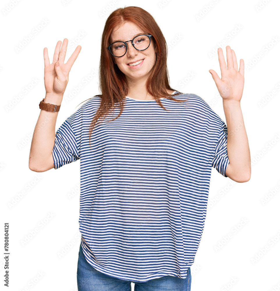 Young read head woman wearing casual clothes and glasses showing and pointing up with fingers number nine while smiling confident and happy. Young read head woman wearing casual clothes and glasses showing and pointing up with fingers number nine while smiling confident and happy.