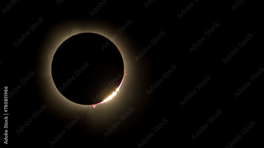 Awe-inspiring color photo of the 2024 solar eclipse showing diamond ring effect and solar prominence with red plasma shooting from the sun's surface. Photo taken from Carbondale Illinois area. Awe-inspiring color photo of the 2024 solar eclipse showing diamond ring effect and solar prominence with red plasma shooting from the sun's surface. Photo taken from Carbondale Illinois area.