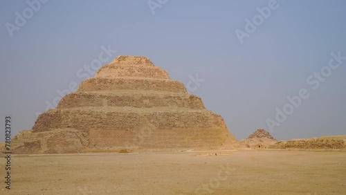 The Pyramid of Djoser or Djeser and Zoser, or Step Pyramid is an archaeological remain in the Saqqara necropolis, Egypt, northwest of the city of Memphis. photo