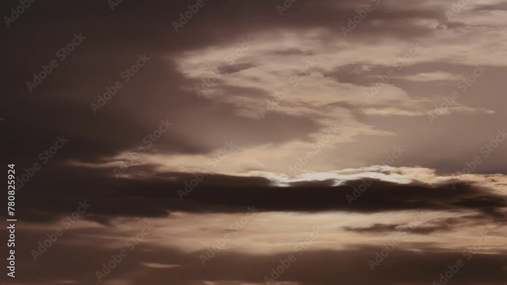 Gray storm clouds with sun behind orange sky rays. Gray storm clouds with sun behind orange sky rays.