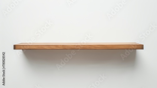 Empty wooden wall shelf presented against a white background.
