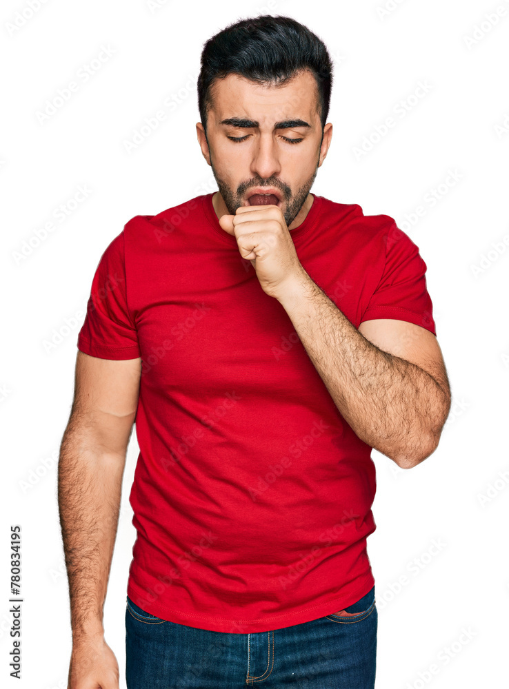 Hispanic man with beard wearing casual red t shirt feeling unwell and coughing as symptom for cold or bronchitis. health care concept. Hispanic man with beard wearing casual red t shirt feeling unwell and coughing as symptom for cold or bronchitis. health care concept.