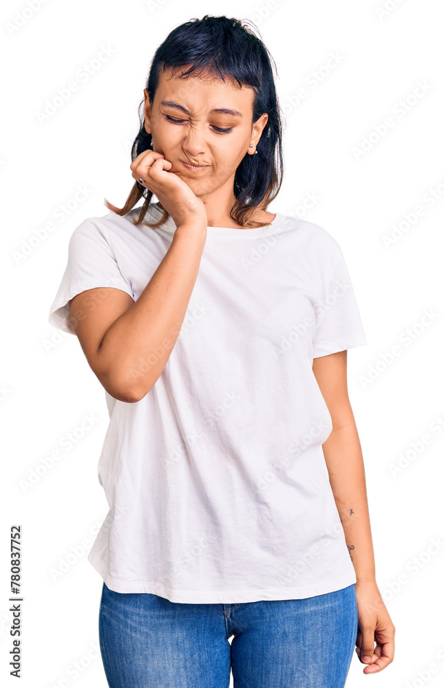 Young woman wearing casual clothes touching mouth with hand with painful expression because of toothache or dental illness on teeth. dentist