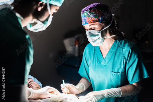 Doctors operating photo