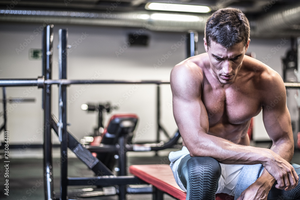 Muscular bodybuilder with towel Muscular bodybuilder with towel