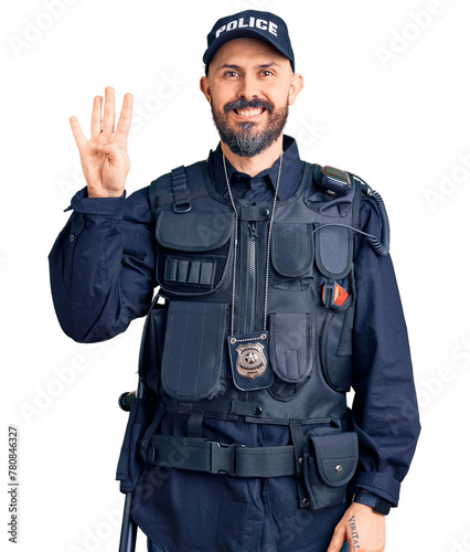 Young handsome man wearing police uniform showing and pointing up with fingers number four while smiling confident and happy.