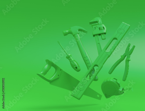 Flying view of monochrome construction tools for repair on multicolor background