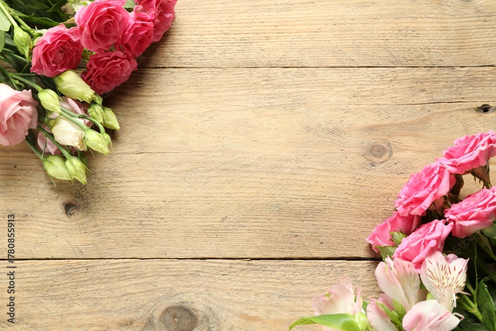 Happy Mother's Day. Beautiful flowers on wooden table, flat lay. Space for text Happy Mother's Day. Beautiful flowers on wooden table, flat lay. Space for text