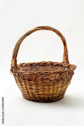 A wicker basket on a plain white background. Suitable for various design projects