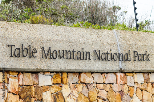 Table Mountain national park sign or signage on a wall, Western Cape, South Africa concept travel and tourism