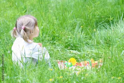 happy child having fun playing in the nature park