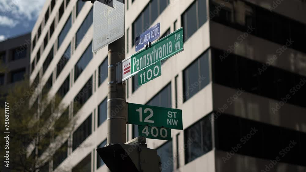 Pennsylvania Avenue, NW and 12th street NW street signs in downtown Washington DC area of lobbying and lawyers in nations capital Pennsylvania Avenue, NW and 12th street NW street signs in downtown Washington DC area of lobbying and lawyers in nations capital
