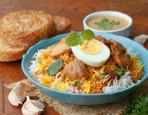 Biryani,egg,chatni white baground © Priyanka