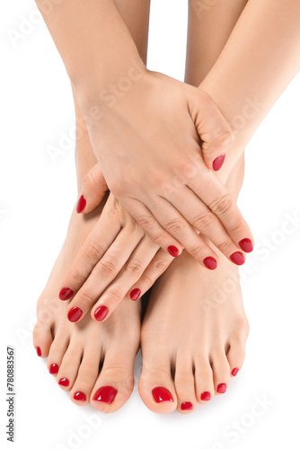 Woman showing stylish toenails after pedicure procedure and manicured hands with red nail polish isolated on white, top view