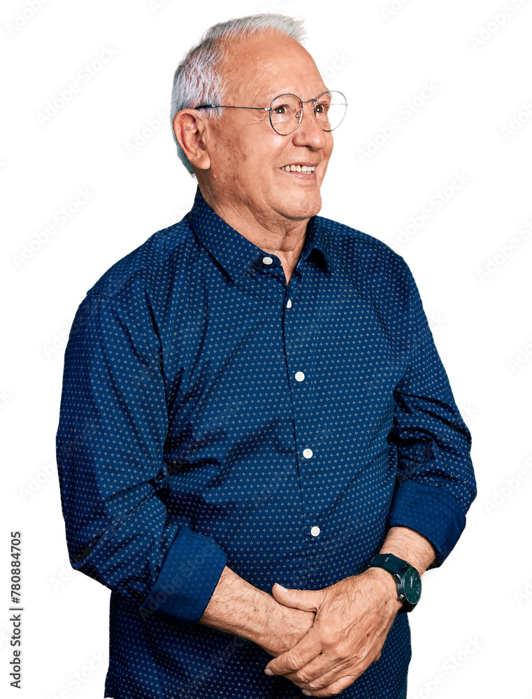 Senior man with grey hair wearing casual shirt and glasses looking away to side with smile on face, natural expression. laughing confident. Senior man with grey hair wearing casual shirt and glasses looking away to side with smile on face, natural expression. laughing confident.