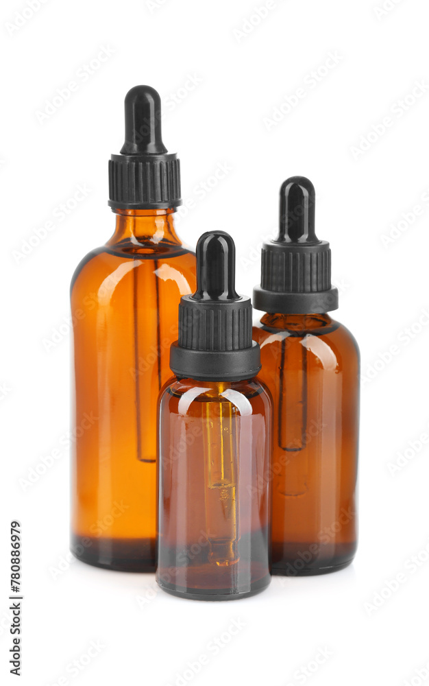 Glass bottles of tincture isolated on white