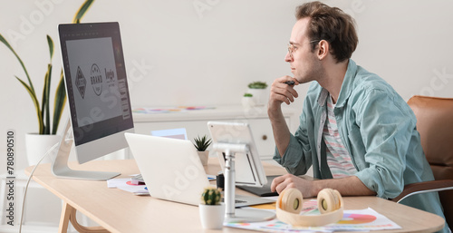 Male graphic designer devel...