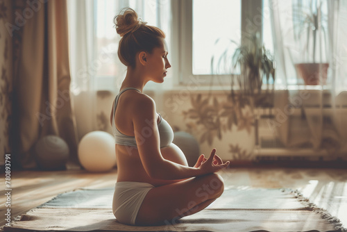 Pregnant woman engage in yoga practice at home, surrounded by greenery and bathed in natural light