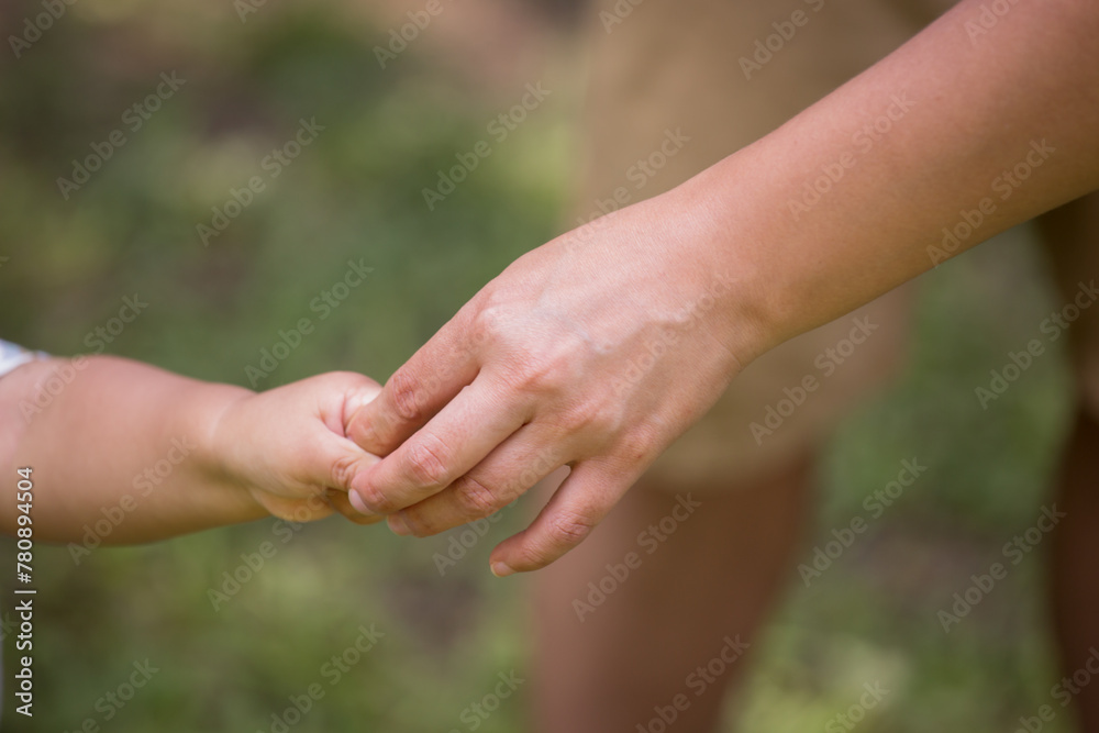 Family members holding hands together in union Family members holding hands together in union