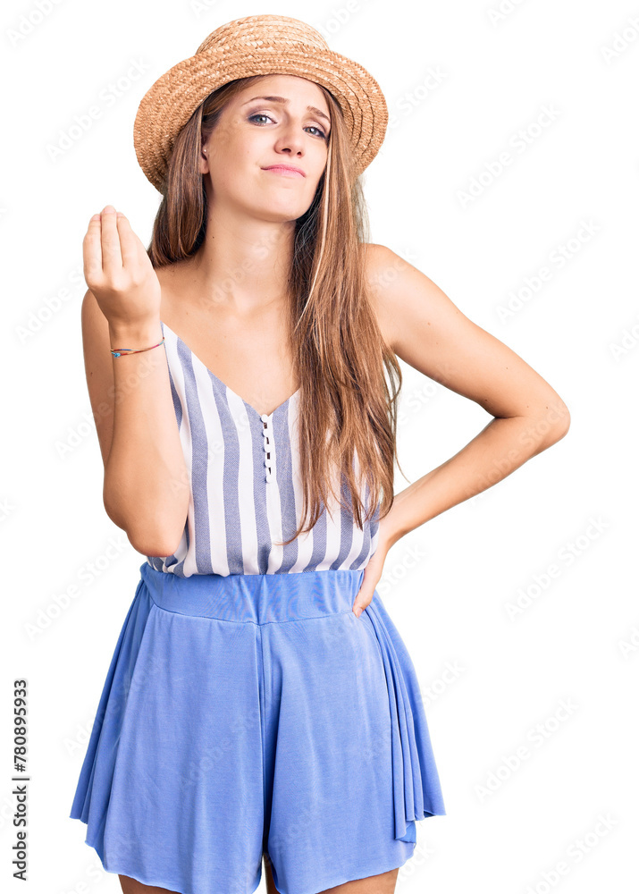 Young beautiful blonde woman wearing summer hat doing italian gesture with hand and fingers confident expression Young beautiful blonde woman wearing summer hat doing italian gesture with hand and fingers confident expression